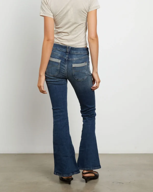 Shop BDG URBAN OUTFITTERS Bdg Tiana Low Rise Flare Jeans In Dark Vintage
