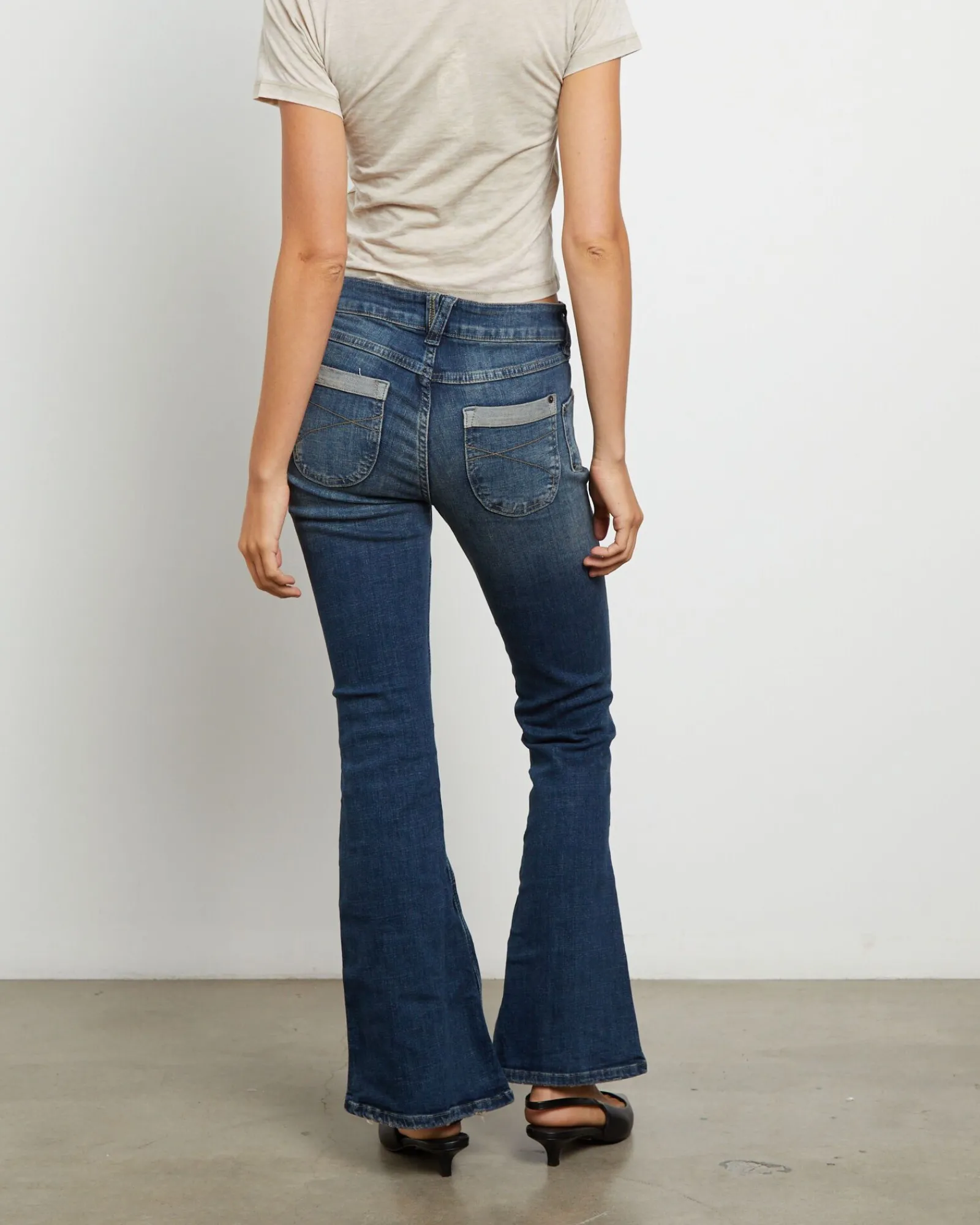 bdg_tiana_low_rise_flare__1.webp Shop BDG URBAN OUTFITTERS Bdg Tiana Low Rise Flare Jeans In Dark Vintage