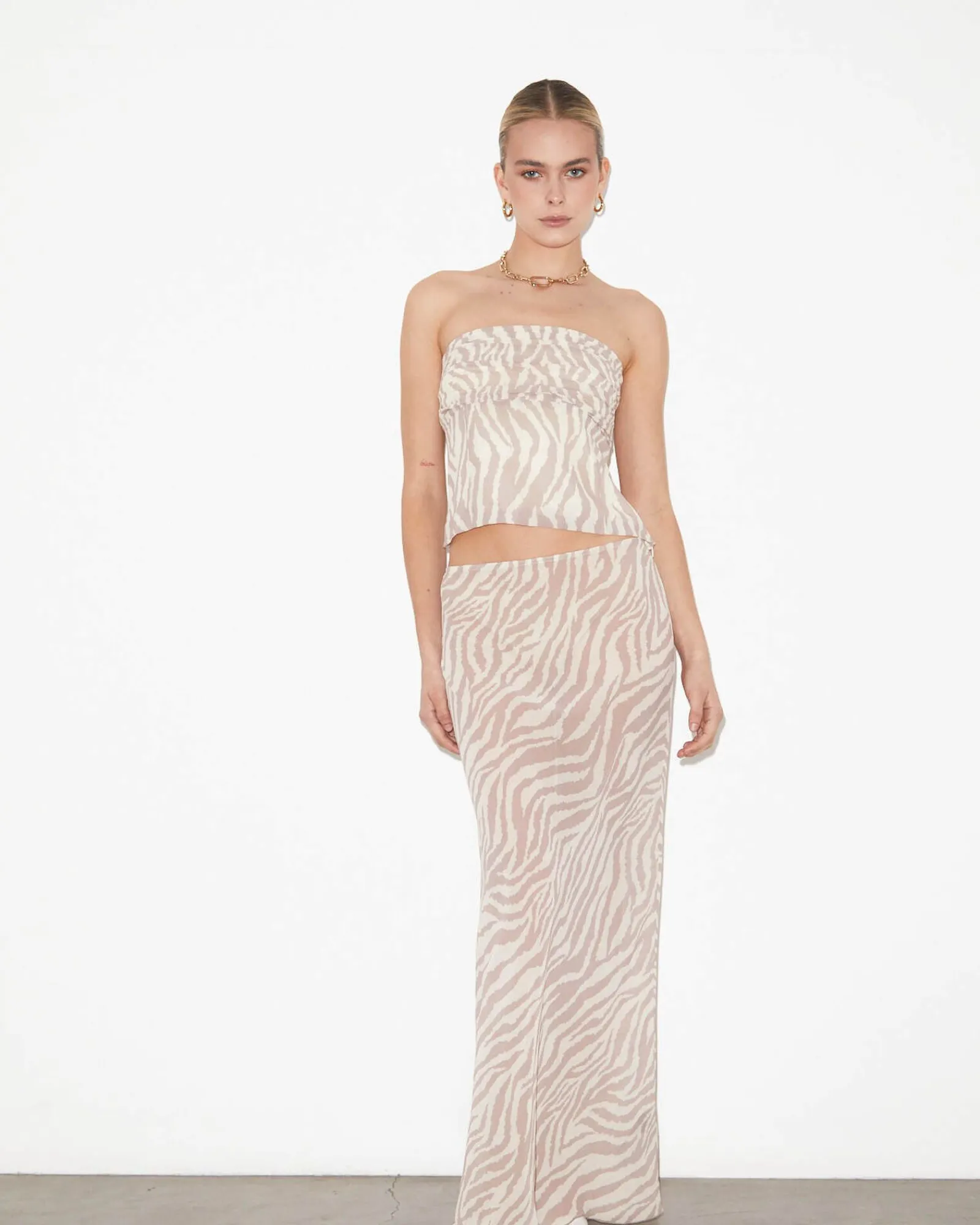 cassie_low_rise_sheer_sli_0.webp Clearance STUDIO Cassie Low Rise Sheer Slip Skirt In Beige