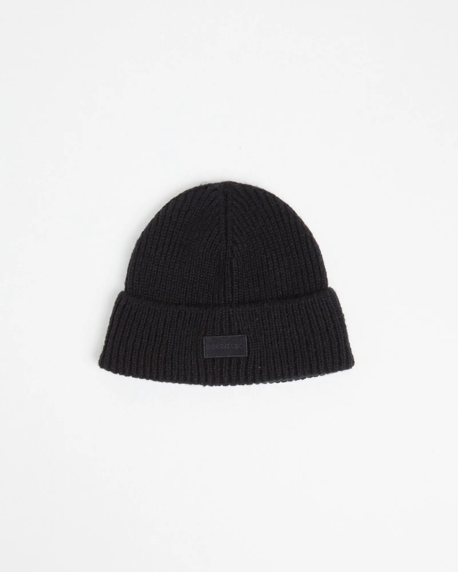 olsen_melang_beanie_0.webp Shop SUBTITLED Olsen Melang Beanie