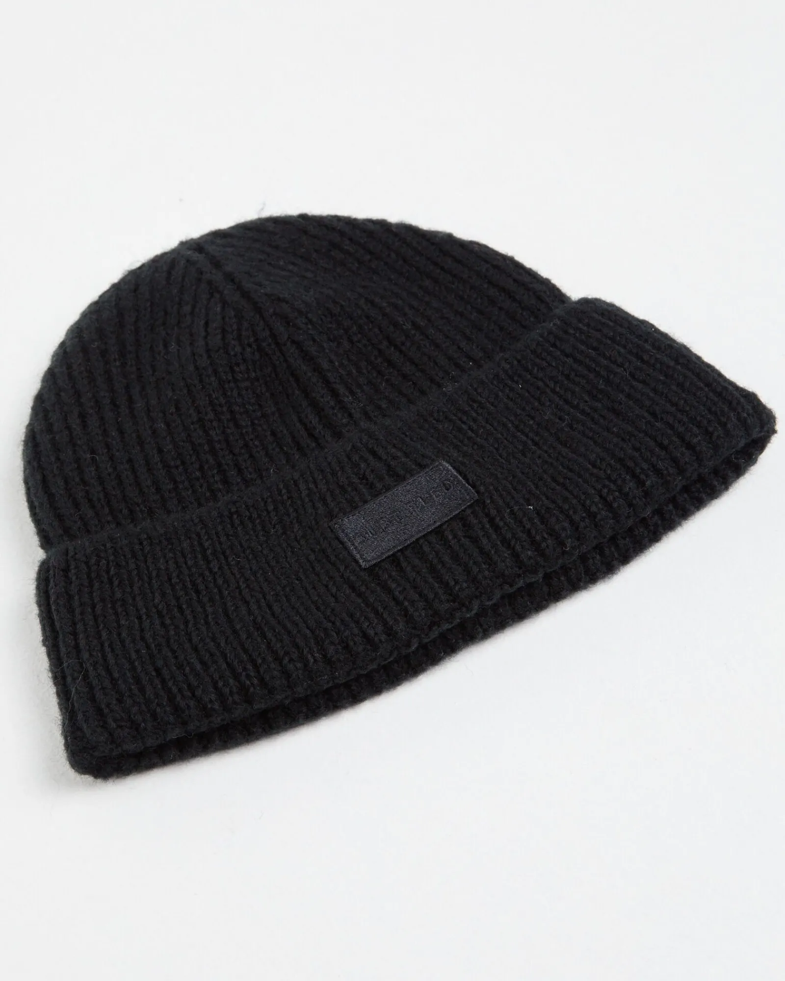 olsen_melang_beanie_1.webp Shop SUBTITLED Olsen Melang Beanie