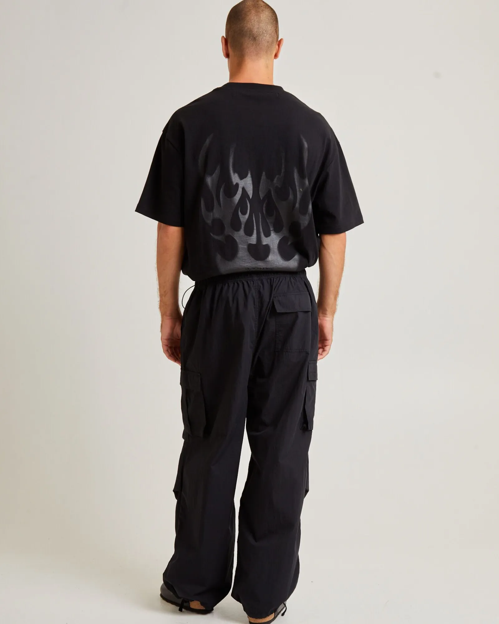 oversized_parachute_cargo_1.webp Best BLACK NOISE WHITE RAIN Oversized Parachute Cargo Pant In Black