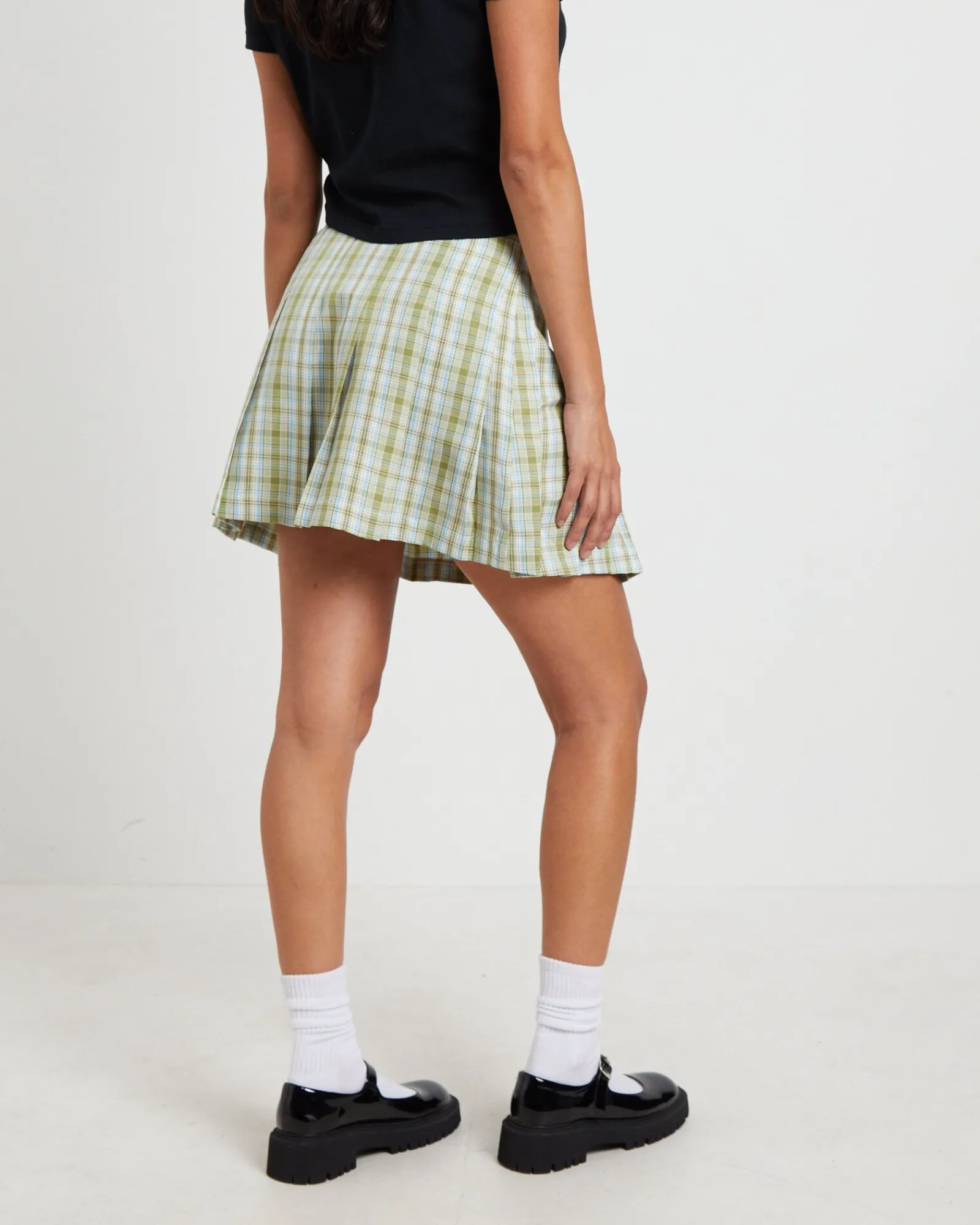 plaid_pleated_skirt_in_ar_1.webp Discount X GIRL Plaid Pleated Skirt In Army Green