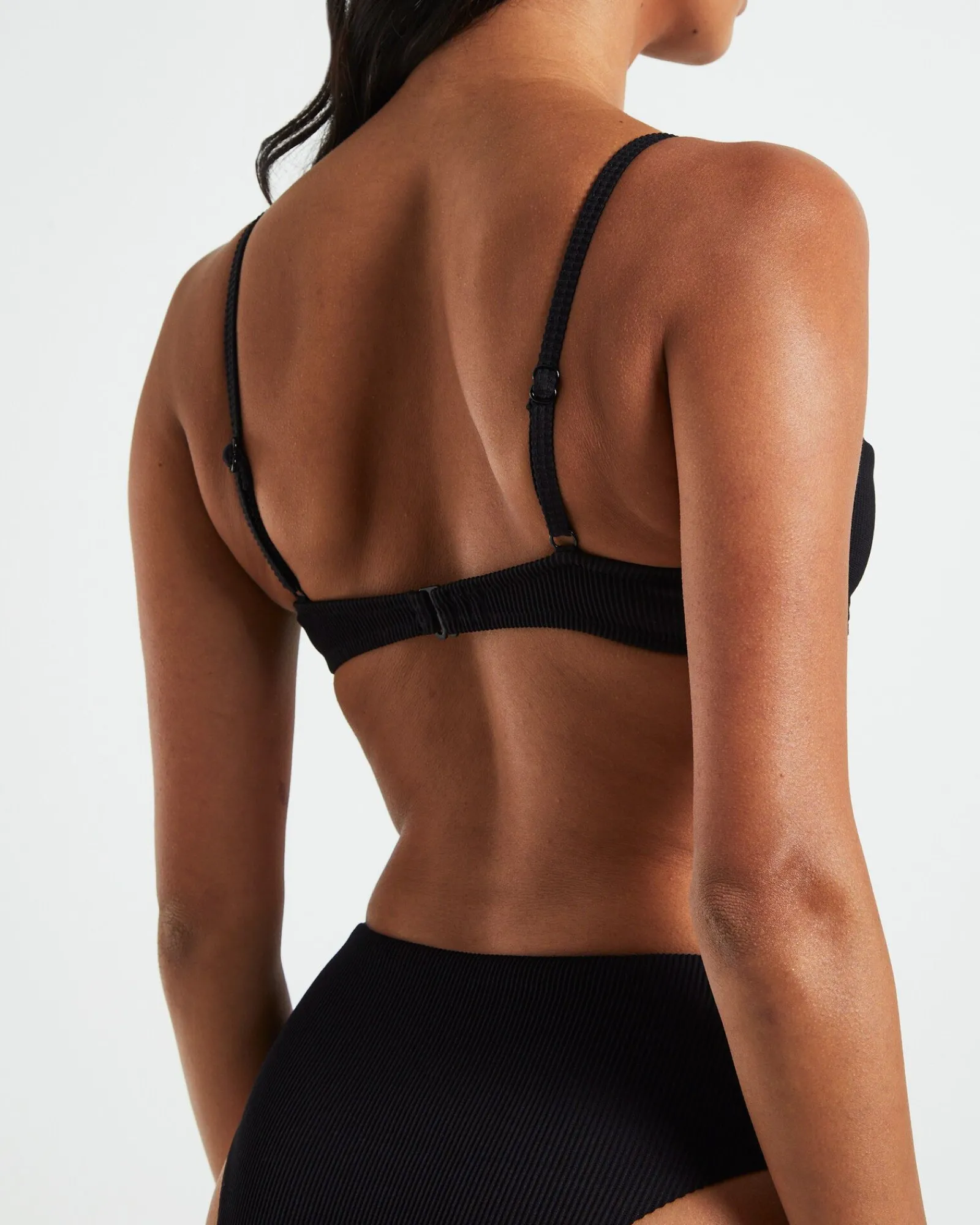 rib_cut_out_underwire_bik_5.webp New SUBTITLED Rib Cut Out Underwire Bikini Top In Black