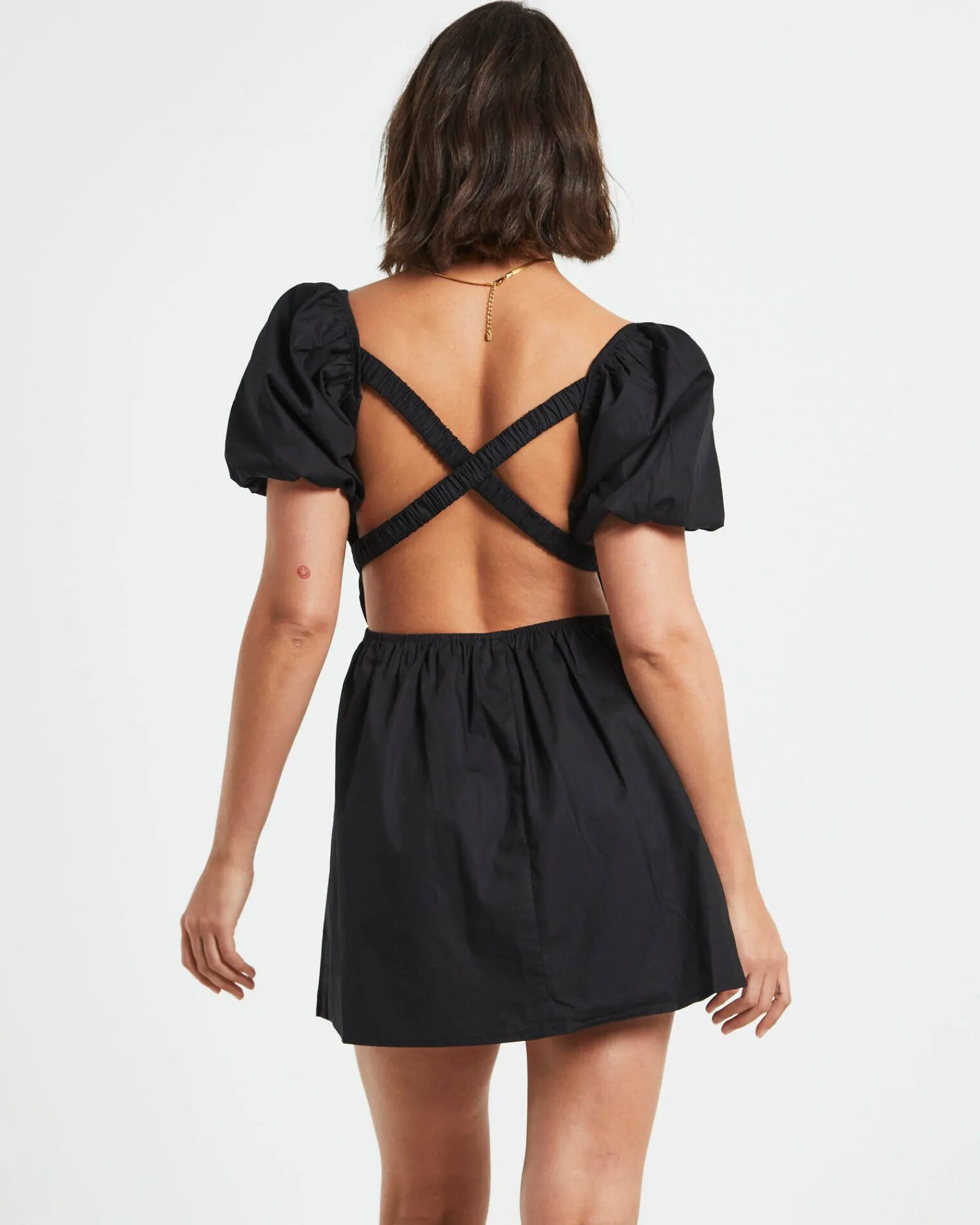 rylee_backless_puff_sleev_1.webp Store SUBTITLED Rylee Backless Puff Sleeve Mini Dress In Black