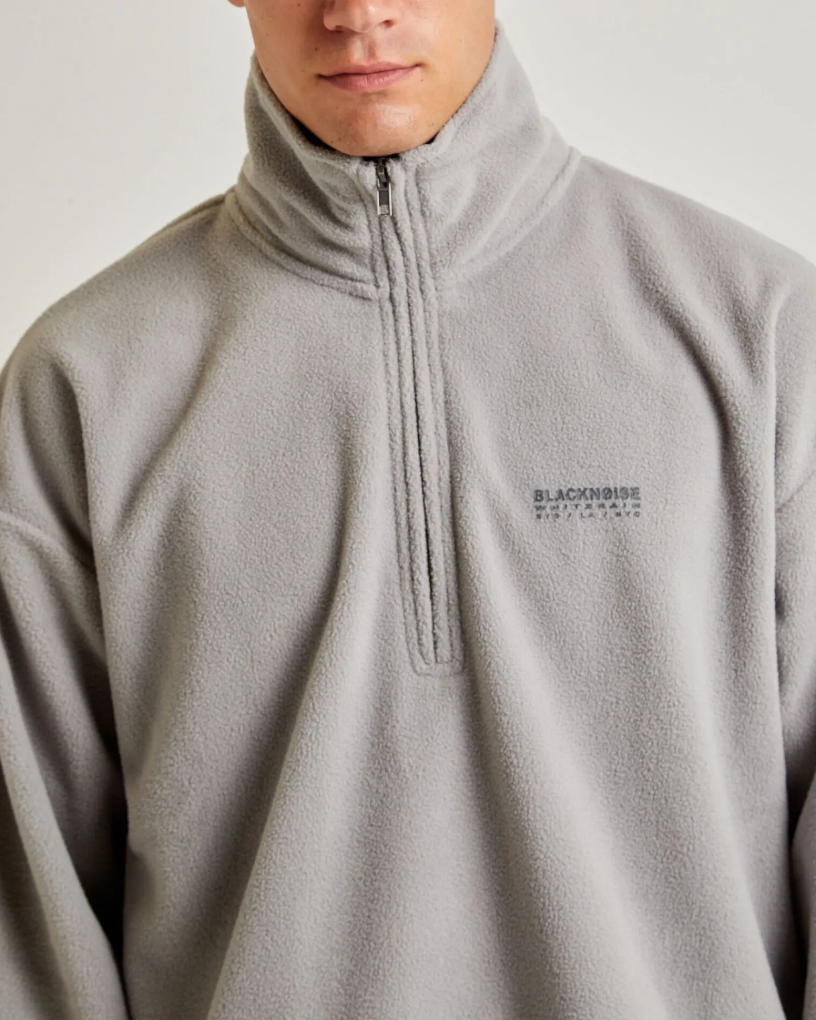 seeka_polar_fleece_quarte_6.webp Outlet BLACK NOISE WHITE RAIN Seeka Polar Fleece Quarter Zip
