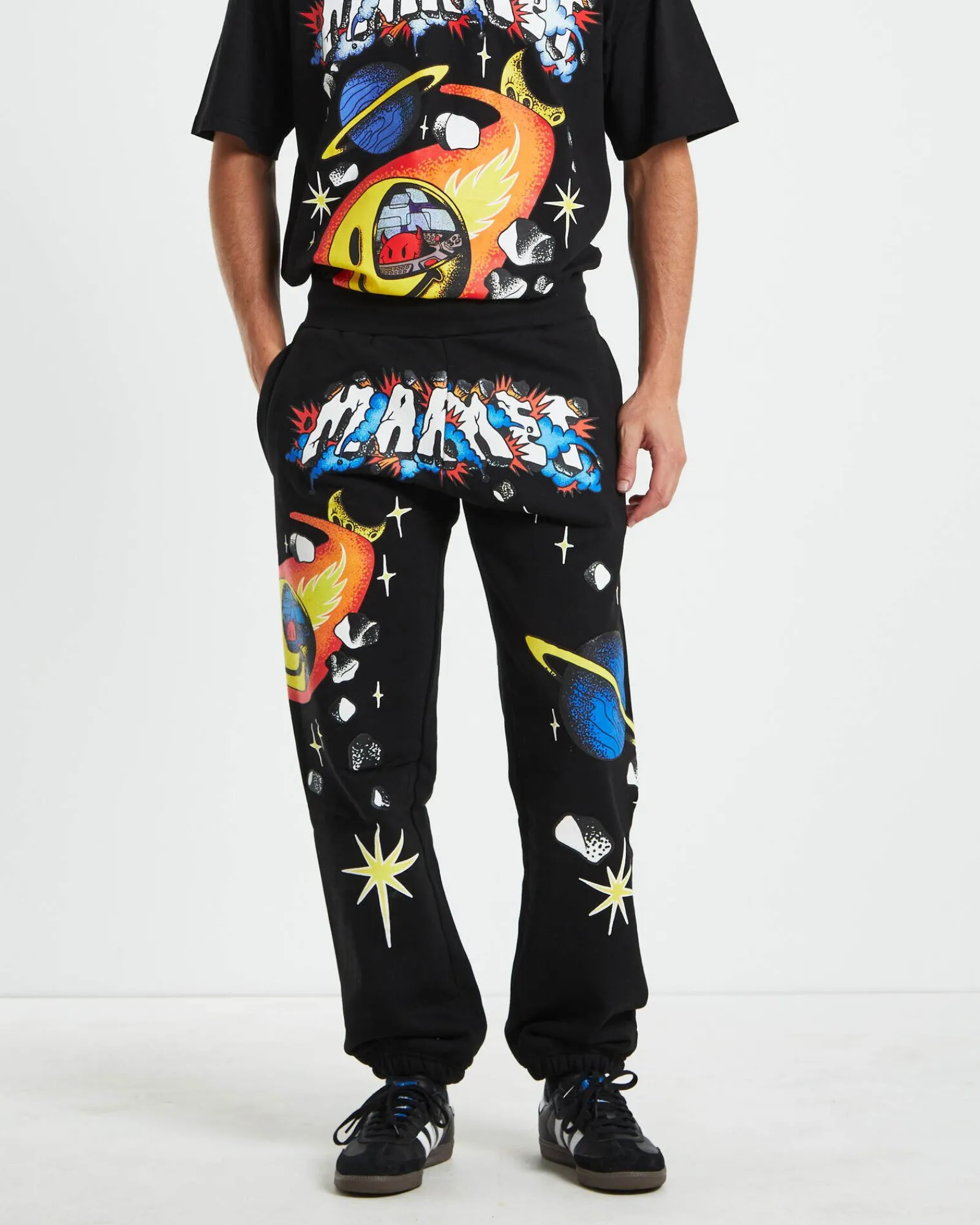smiley_conflicted_sweatpa_1.webp Cheap MARKET Smiley Conflicted Sweatpants In Black
