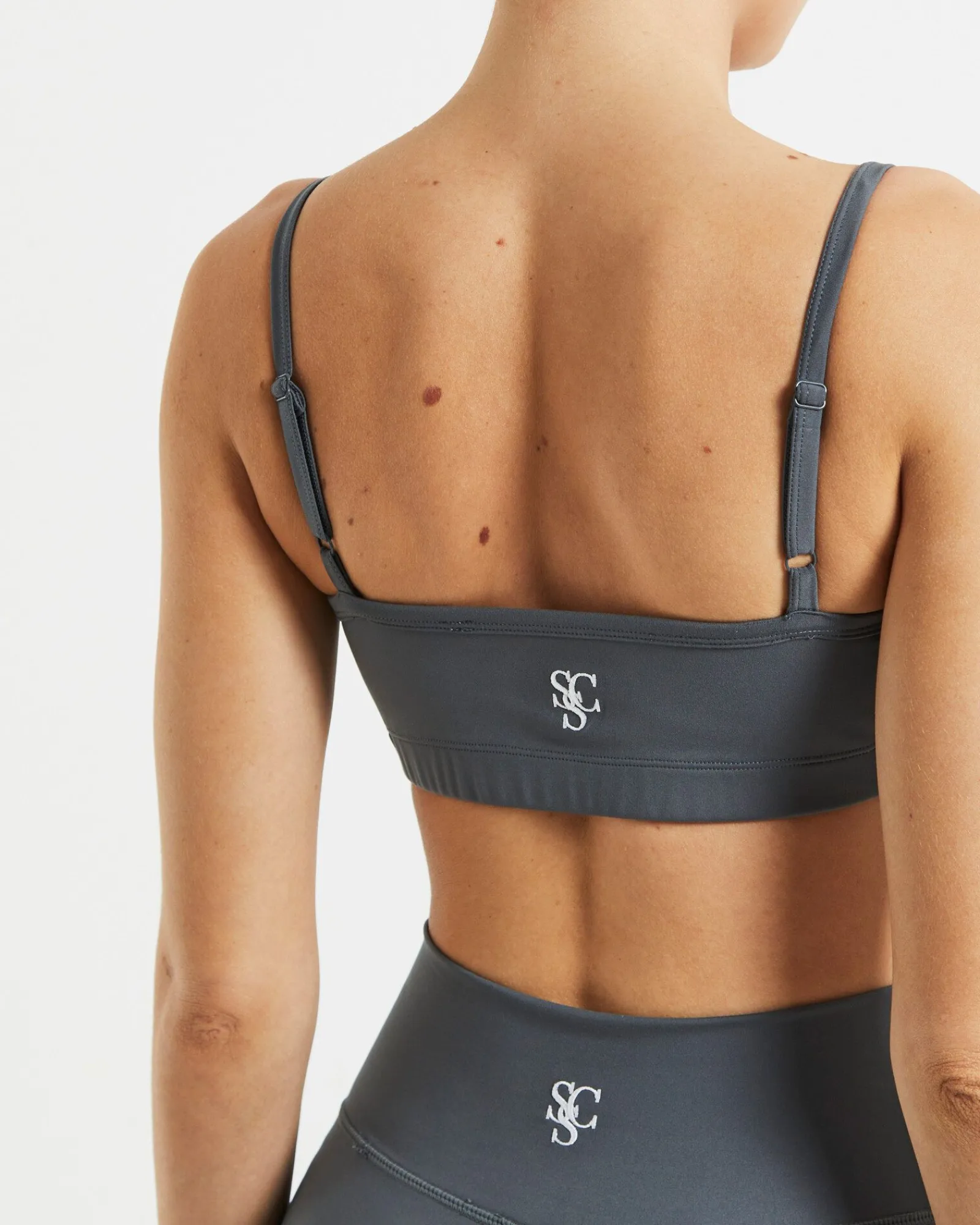 sports_strappy_crop_top_i_5.webp Fashion SUBTITLED SPORTS CLUB Sports Strappy Crop Top In Charcoal Grey