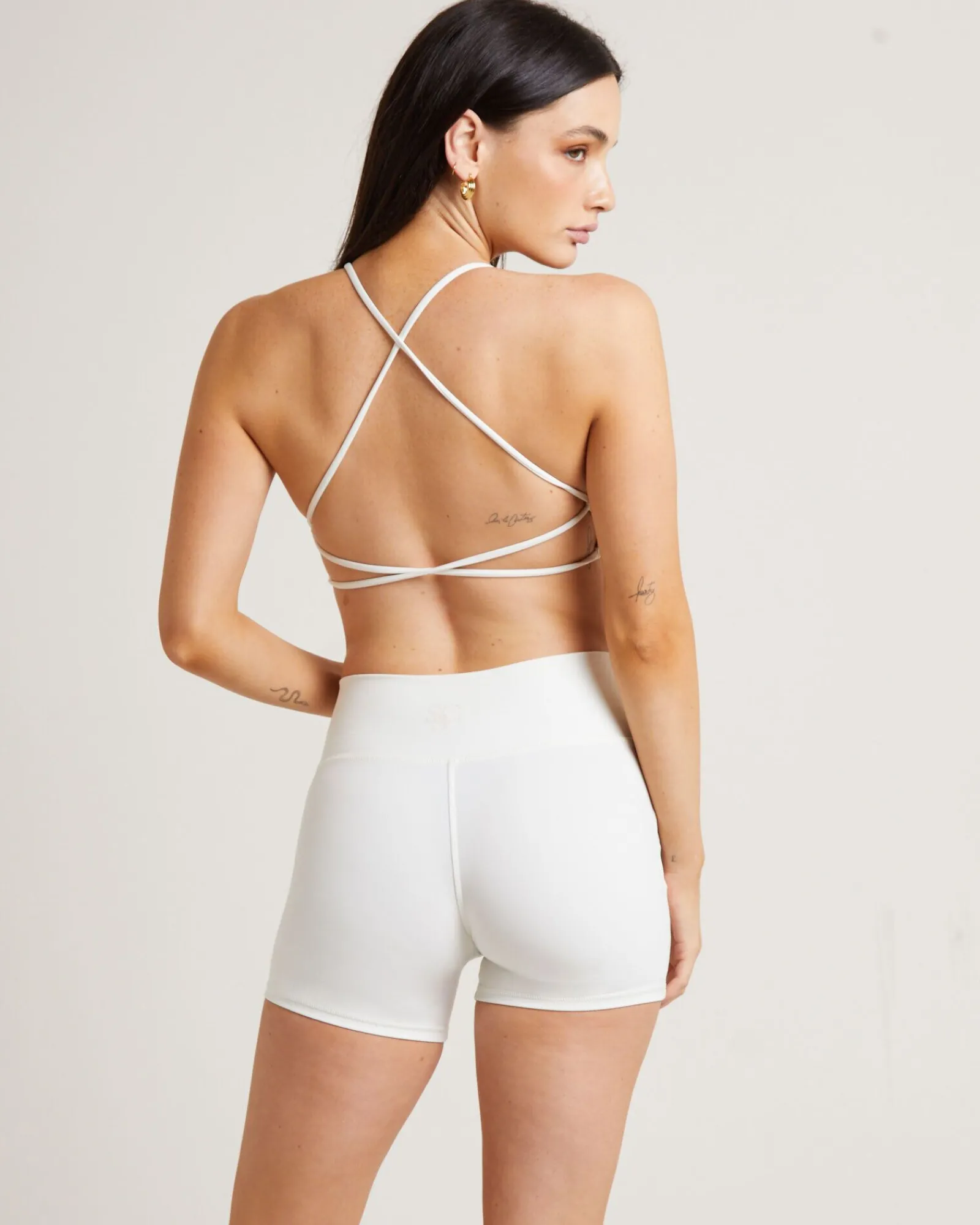 stringy_cross_back_crop_t_1.webp Sale SUBTITLED SPORTS CLUB Stringy Cross Back Crop Top In White