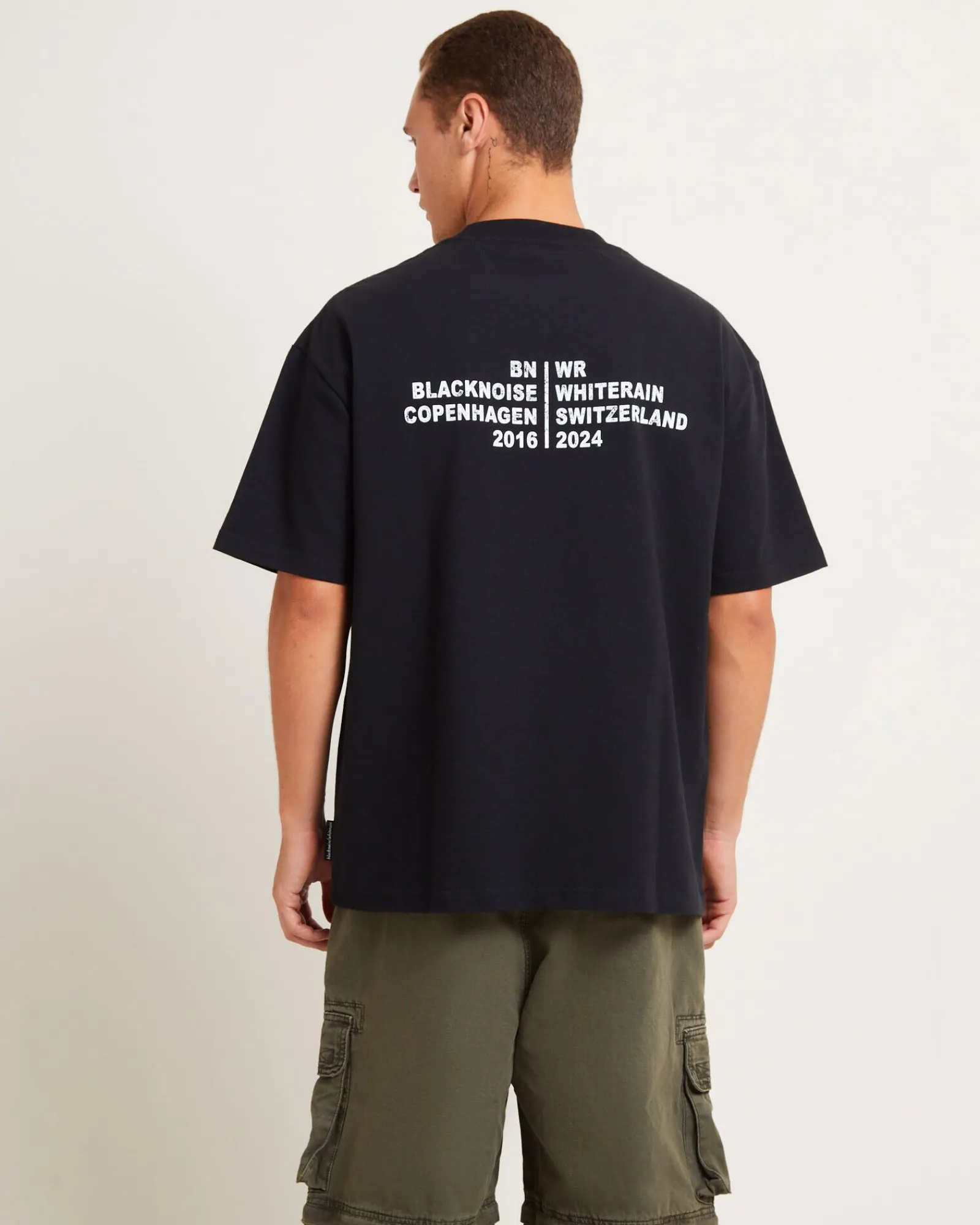 tour_short_sleeve_tshirt__0-1.webp Hot BLACK NOISE WHITE RAIN Tour Short Sleeve T-Shirt In White