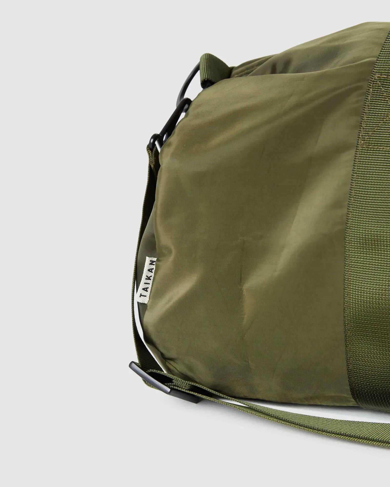 yocka_tote_bag_in_olive_g_1.webp Store TAIKAN Yocka Tote Bag In Olive Green